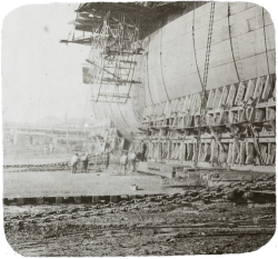 Lantern slide of launching a ship.